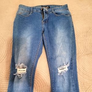 Size 7 faded dark wash skinny jeans